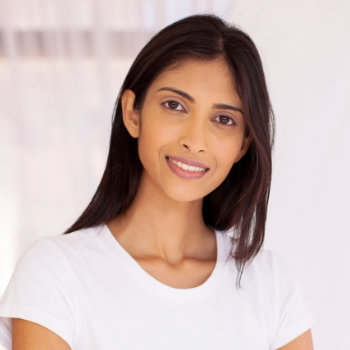 young indian woman with beautiful white smile
